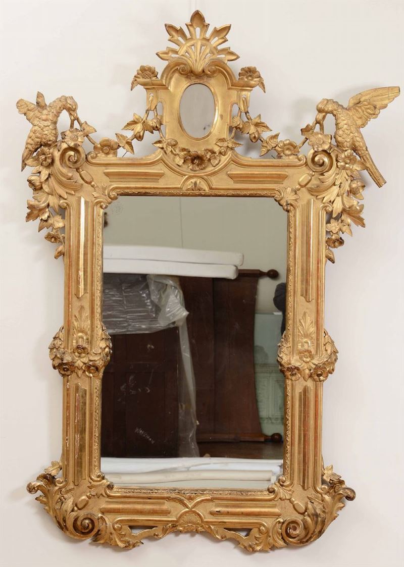 Grande specchiera in legno intagliato e dorato, XIX secolo  - Asta Antiquariato I - Asta a Tempo - Cambi Casa d'Aste