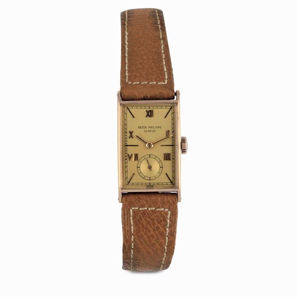 PATEK PHILIPPE - Elegante orologio di forma in oro rosa18ct. ref. 1468, carica manuale, circa 1939, con estratto d'archivio