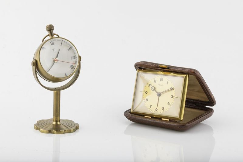 Lotto composta da: un orologio da scrivania e una sveglia da viaggio -  Auction Timed Auction