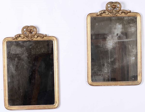 Quattro specchierine in legno dorato, XIX secolo