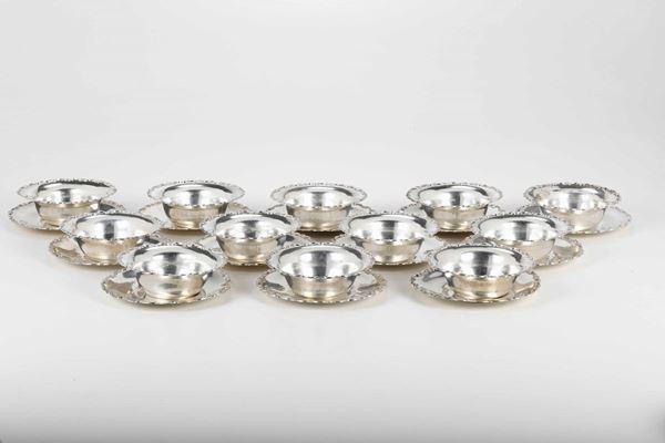 Dodici coppette con piattino in argento. Italia XX secolo