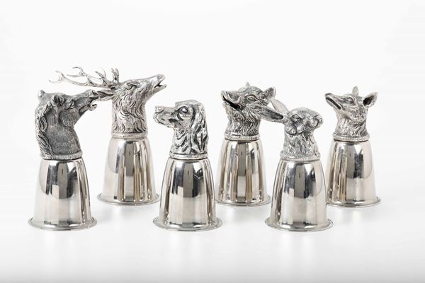 Sei bicchieri in metallo con teste animali a firma Gucci. Italia XX secolo