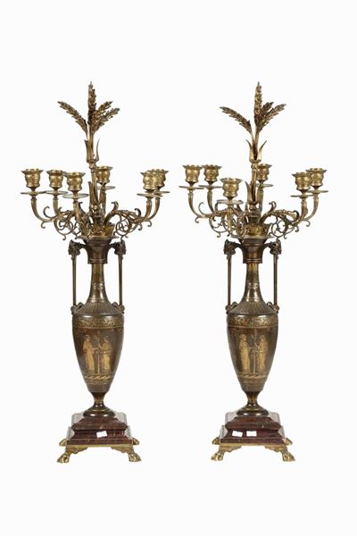 Coppia di Candelabri. Bronzo Dorato e Patinato. Basi in Marmo Rosso. XIX Secolo