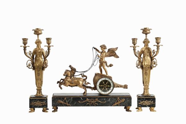 Trittico composto da pendola e coppia di candelabri in bronzo dorato e marmo, Francia XIX-XX secolo