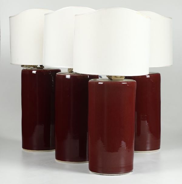 Quattro lampade da tavolo in porcellana sangue di bue, XX secolo