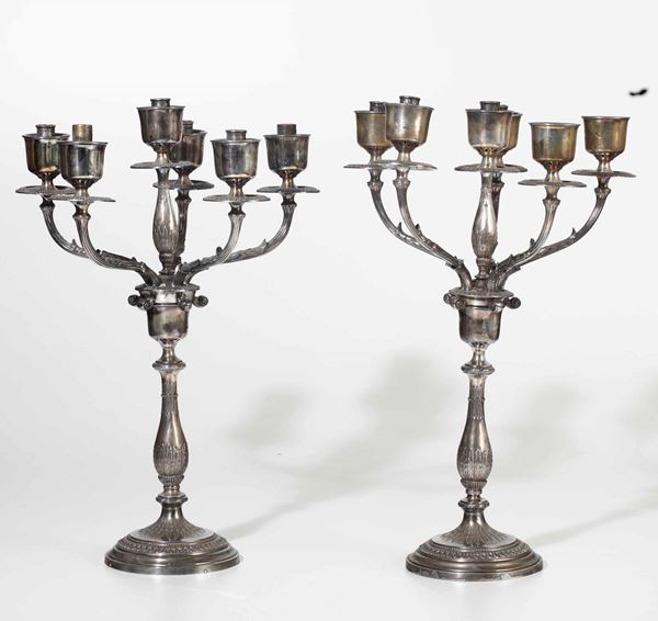 Coppia di candelabri in metallo argentato a cinque luci, XX secolo