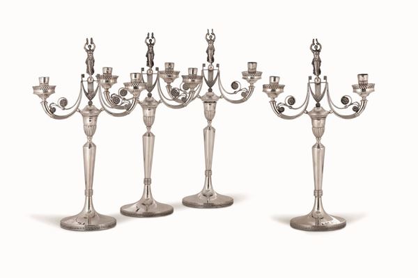 4 silver two-branched candlesticks, 1900s