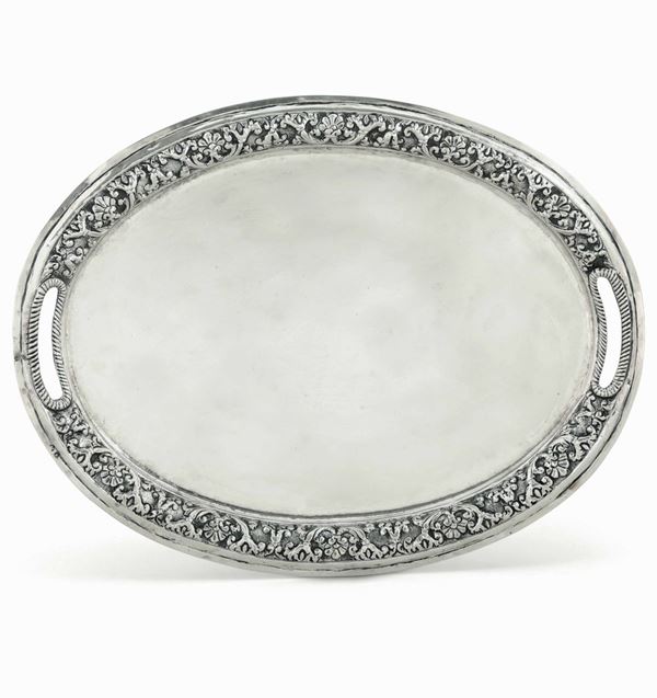 An oval silver tray, likely 1900s