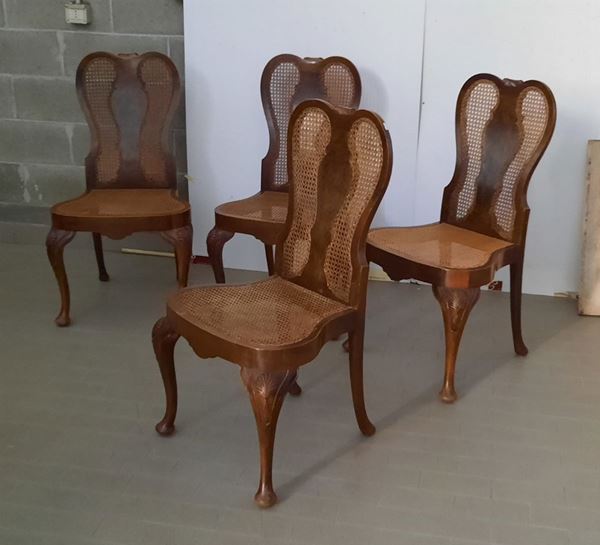 Quattro sedie in legno intagliato e cannetè