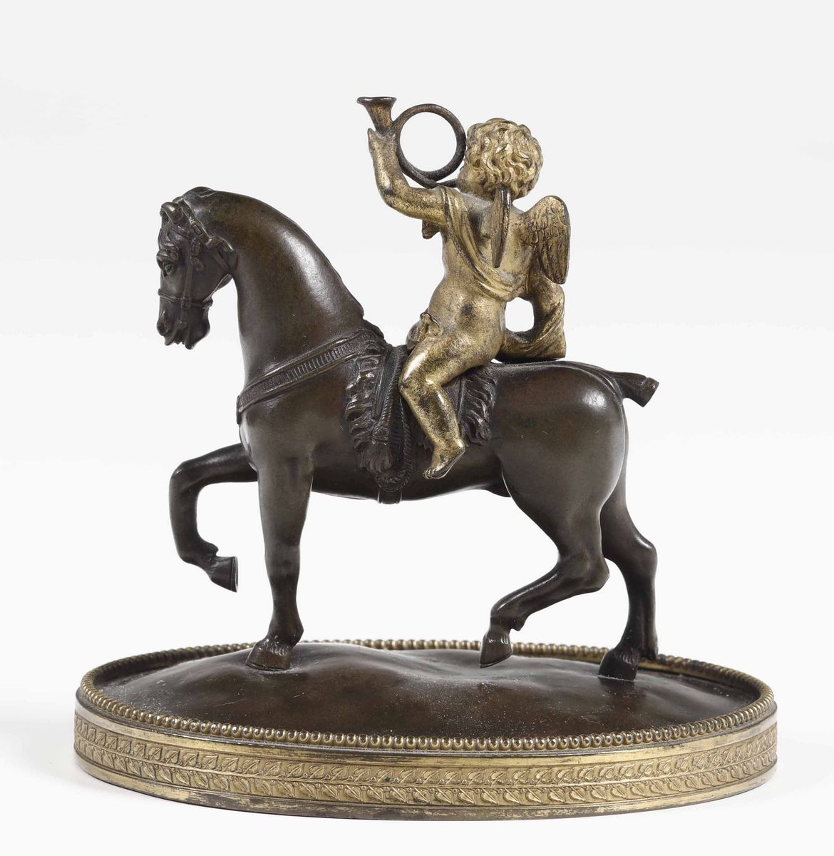 Putto Alato in Ottone Dorato su Cavallo in Ottone Brunito