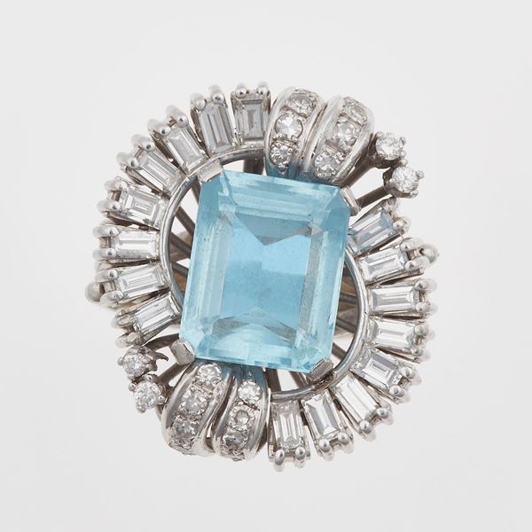 Blue topaz, diamond and platinum ring