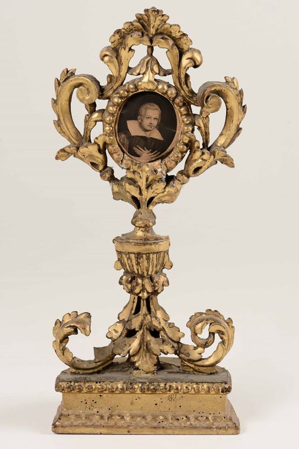 Ostensorio in legno intagliato e dorato. Italia centrale, XIX secolo