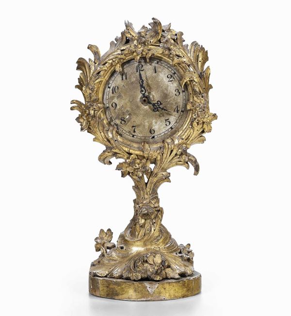 Cassa di orologio in legno intagliato e dorato, XVIII secolo