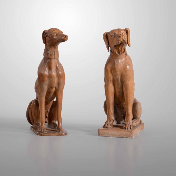 Due cani in terracotta di gusto neoclassico. Manifattura del XX secolo