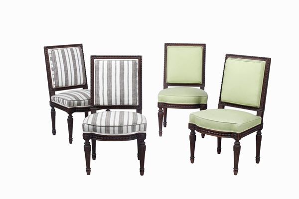 Quattro sedie in legno scolpito, XX secolo