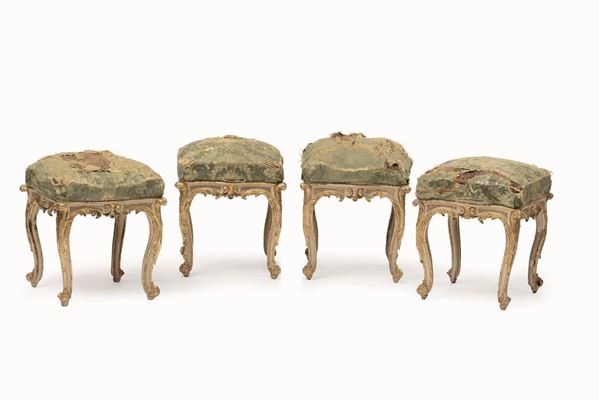 Quattro sgabelli in legno intagliato, laccato e dorato, XIX secolo