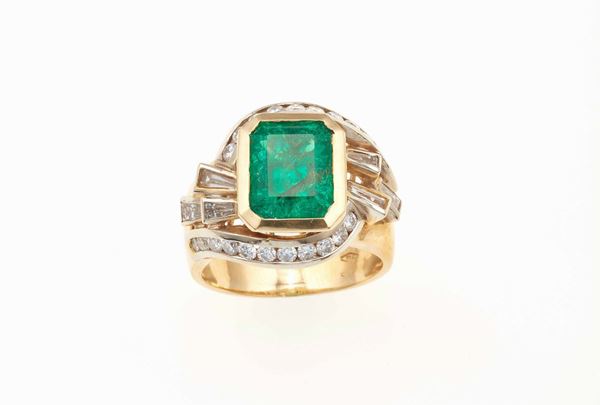 Anello con smeraldo sintetico di ct 5.80 circa con diamanti a contorno