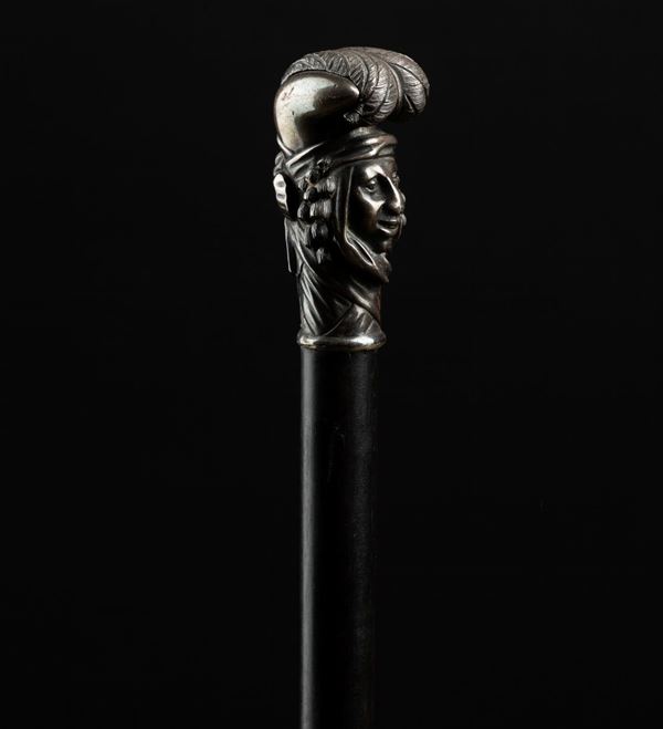 Bastone con pesante impugnatura in ferro e funzione di spacca-testa raffigurante un personaggio femminile, Inghilterra, inizi XX secolo
