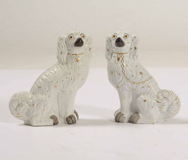Coppia di figurine di cani spaniel Inghilterra, Staffordshire, fine del XIX o inizio del XX secolo