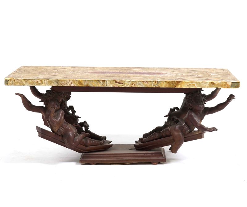 Tavolo basso, base con quattro puttini, piano in marmo. Composto con elementi antichi, XVIII e XX secolo  - Asta Antiquariato - Cambi Casa d'Aste