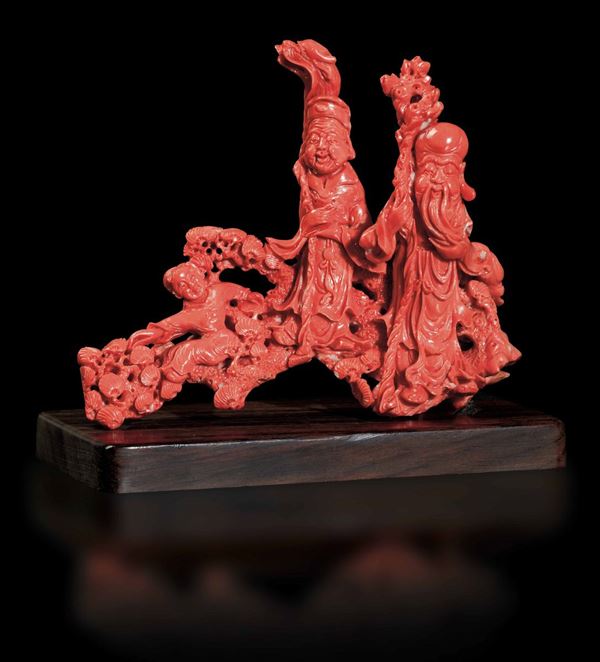A group carved in coral, China, early 1900s