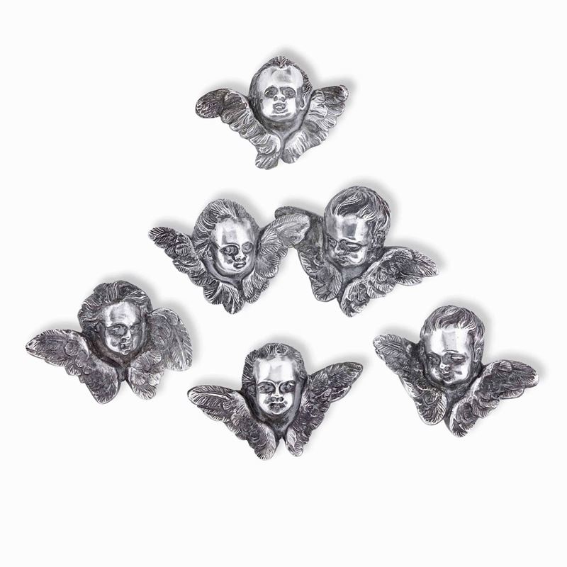 Insieme di sei teste di cherubini in argento fuso e cesellato, Italia  fine XVIII secolo  - Asta Argenti da Collezione - Antichi - I - Cambi Casa d'Aste