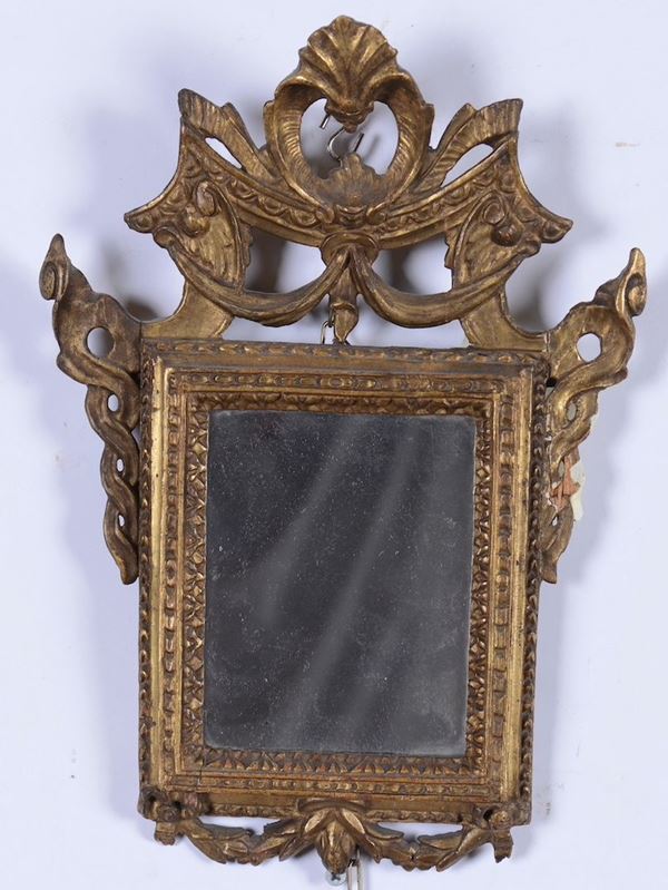 Specchiera in legno intagliato e dorato, XIX-XX secolo
