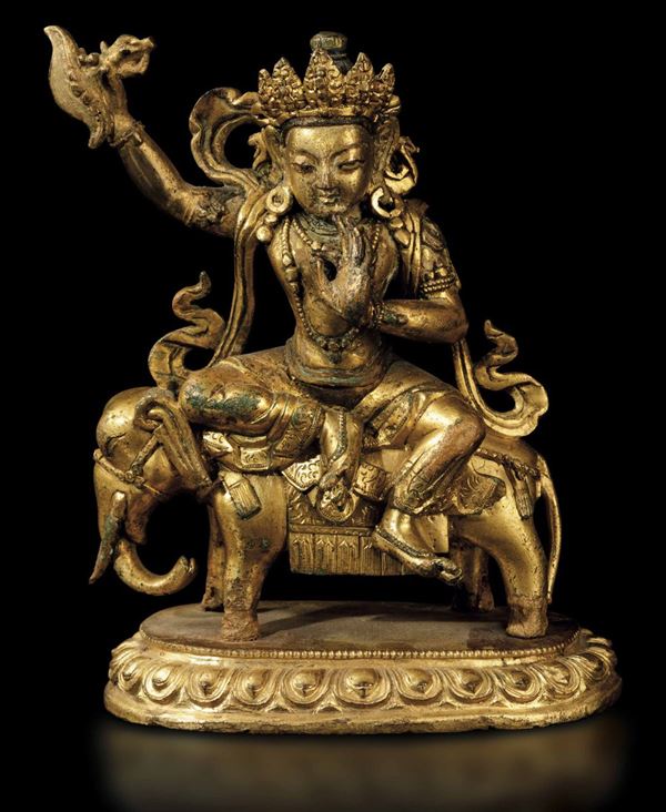 Figura di Samantabhadra in bronzo dorato con in mano karttrka seduto su elefante, Tibet, XVIII secolo
