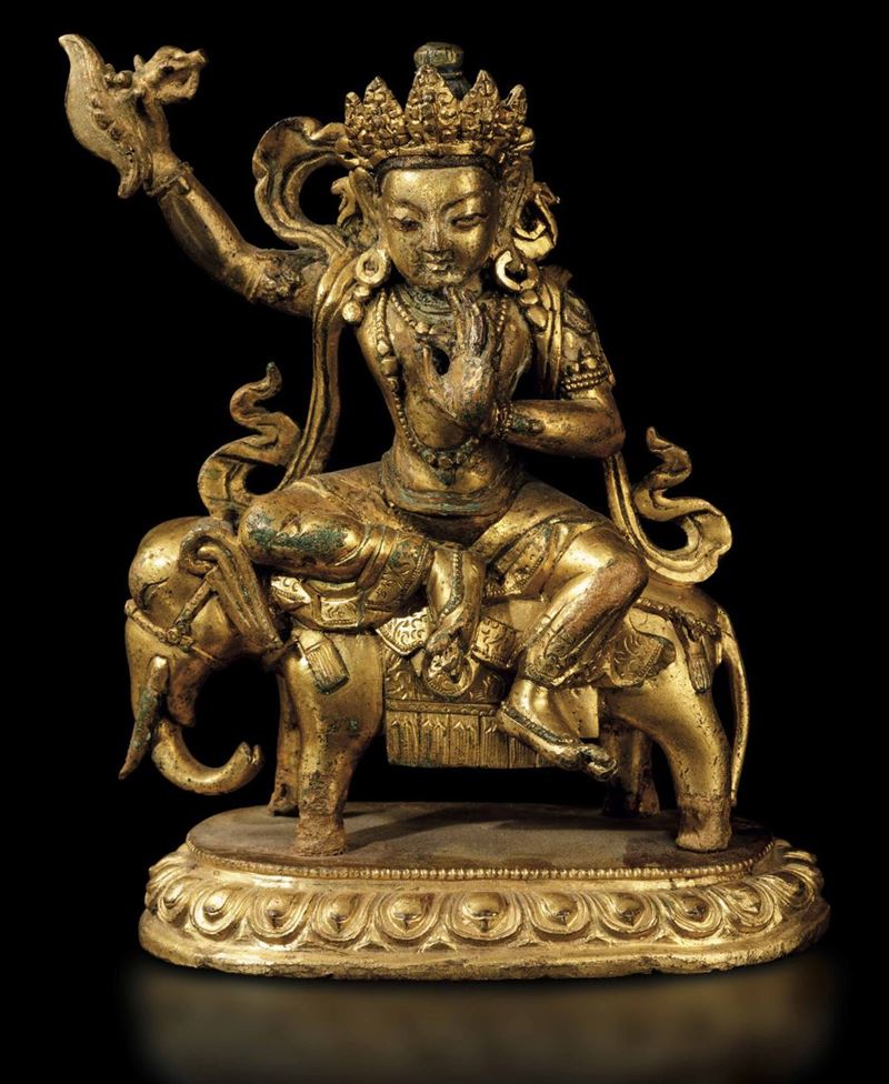 Figura di Samantabhadra in bronzo dorato con in mano karttrka seduto su elefante, Tibet, XVIII secolo  - Asta Fine Chinese Works of Art - Cambi Casa d'Aste