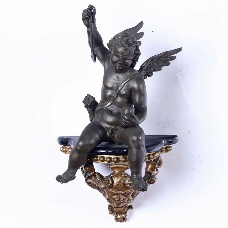 Angioletto in bronzo su base in legno intagliato e dorato. XX secolo  - Auction Sculptures | Cambi Time - Cambi Casa d'Aste
