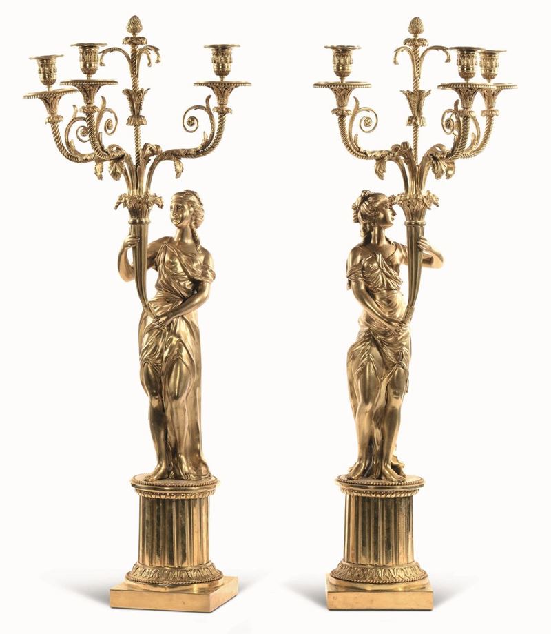Coppia di grandi flambeaux a quattro fiamme in bronzo dorato. Fonditore del XIX-XX secolo  - Asta Importanti Opere e Arredi - Cambi Casa d'Aste