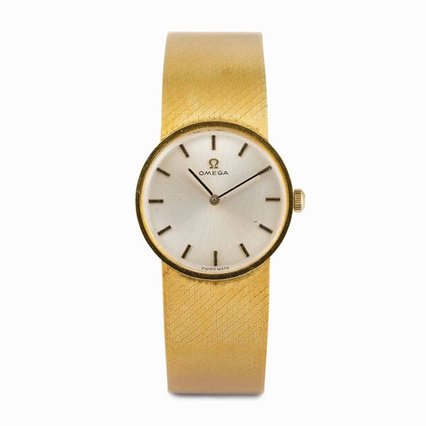 OMEGA - Elegante orologio in oro 18 ct. carica manuale, bracciale integrato, 28mm