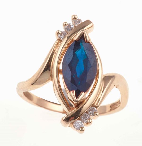 Sapphire, diamond and low karat gold ring