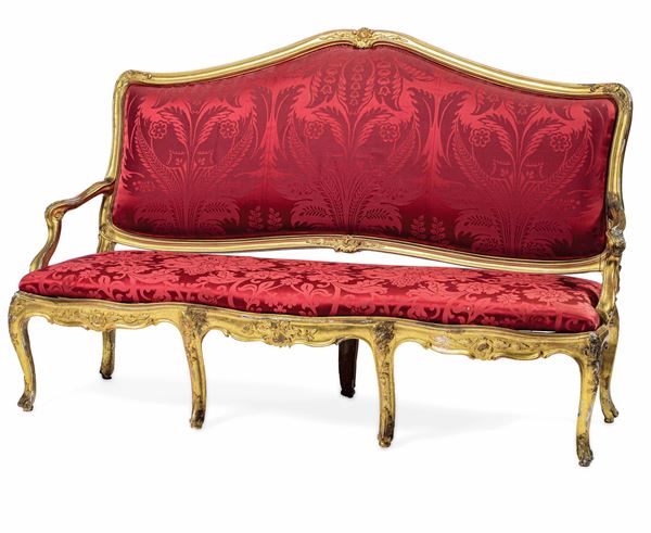 Salotto in legno intagliato e dorato composto da divano e sei sedie, Genova XVIII secolo