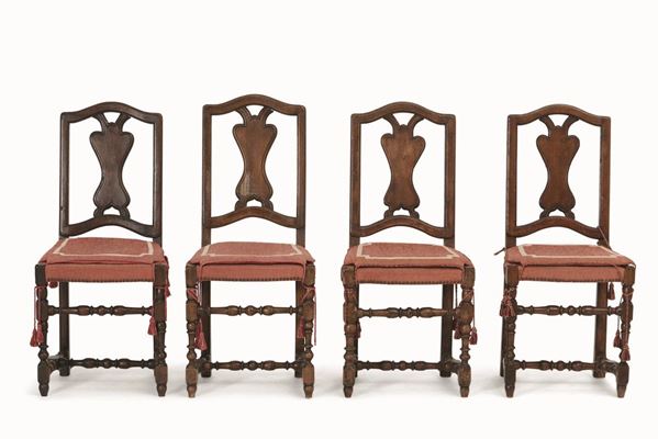 Dodici sedie in noce con gamba tornita, XIX secolo