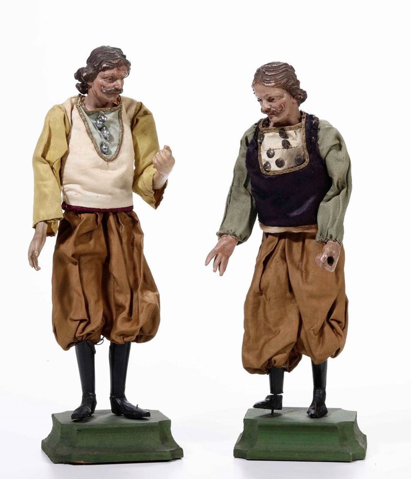 Due statuine da presepe raffiguranti uomini con baffi e pantaloni marroni. Genova XIX secolo  - Auction Neapolitan crib | Cambi Time - I - Cambi Casa d'Aste