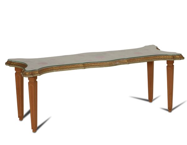 Tavolo in legno intagliato, dipinto e piano in vetro, XX secolo