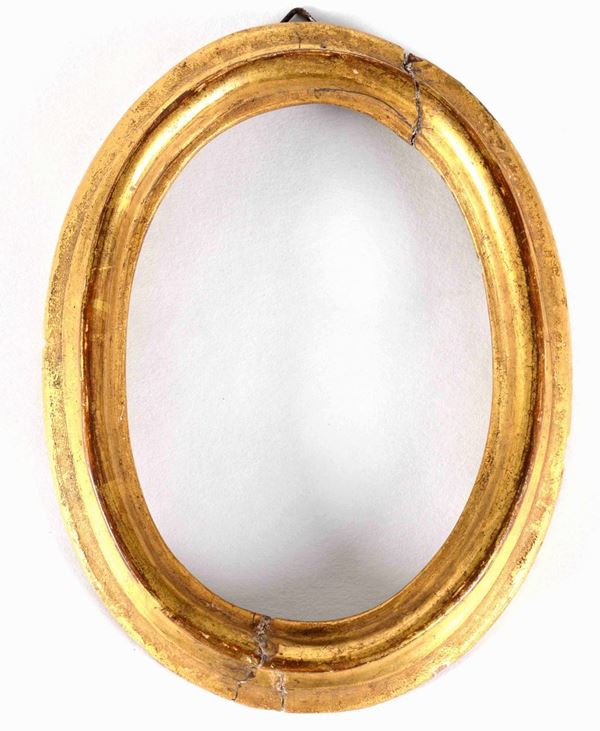 Cornice ovale in legno dorato, XVIII secolo