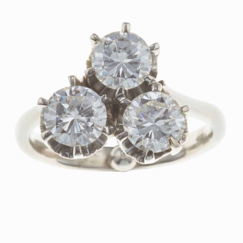 Anello con tre diamanti taglio brillante per ct 1.50 circa  - Asta Gioielli | Cambi Time - Cambi Casa d'Aste