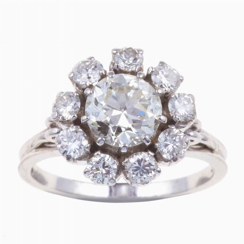 Anello con diamante taglio brillante di ct 1.00 circa e diamanti taglio brillante a contorno  - Auction Jewels | Cambi Time - Cambi Casa d'Aste