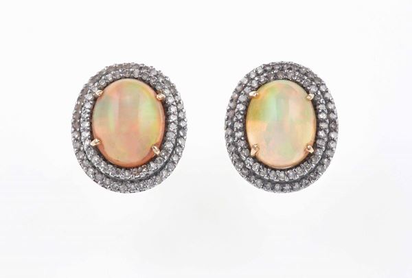 Pair of opal, diamond, gold and silver earrings