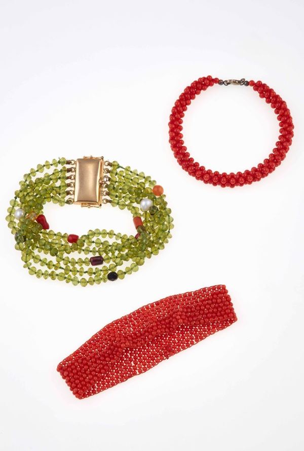 Three coral and peridot bracelets