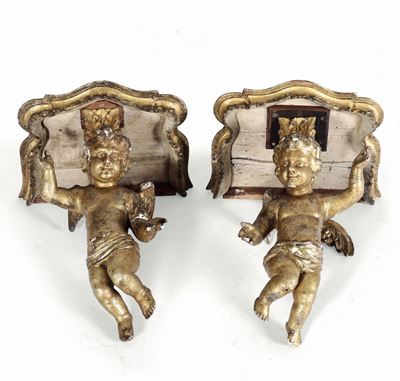 Coppia di Mensole in Legno Intagliato e Dorato Sorrette da Putto, XVIII Secolo