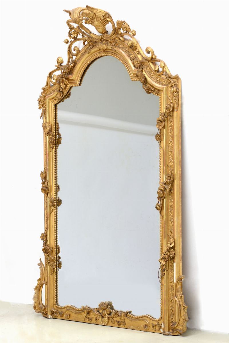Specchiera in legno intagliato e dorato  - Asta Antiquariato Gennaio | Cambi Time - Cambi Casa d'Aste