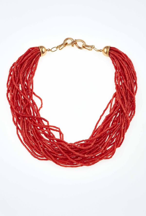Multi-strand coral and gold necklace