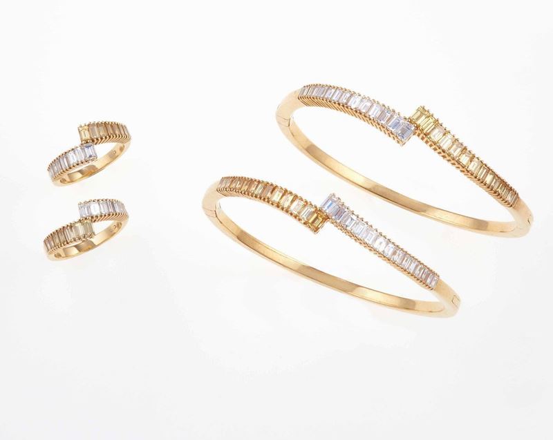 Coppia di bracciali ed anelli con diamanti bianchi e gialli taglio baguette  - Auction Fine Jewels - III - Cambi Casa d'Aste