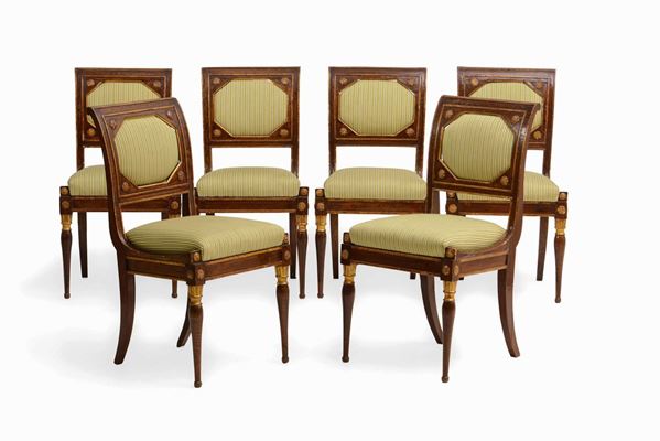 Sei sedie Impero in legno intagliato, laccato e dorato, XIX secolo