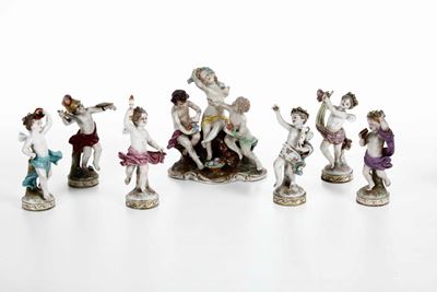 Un Gruppo e Sei Figurine di Putti XX Secolo