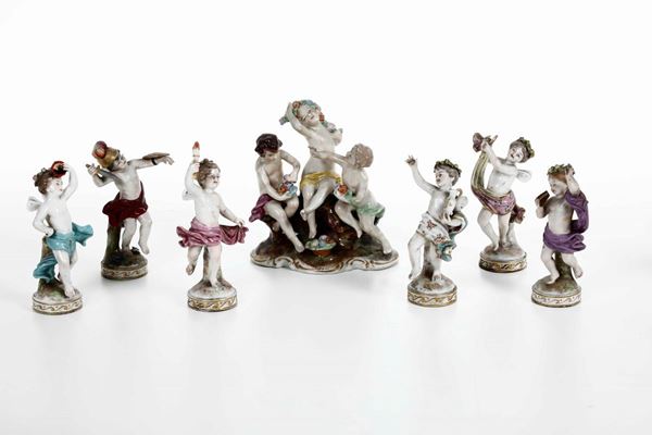 Un gruppo e sei figurine di putti XX secolo