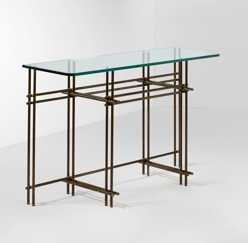 Consolle con struttura in tondino metallico e piano in cristallo molato.  - Auction Design - Cambi Casa d'Aste